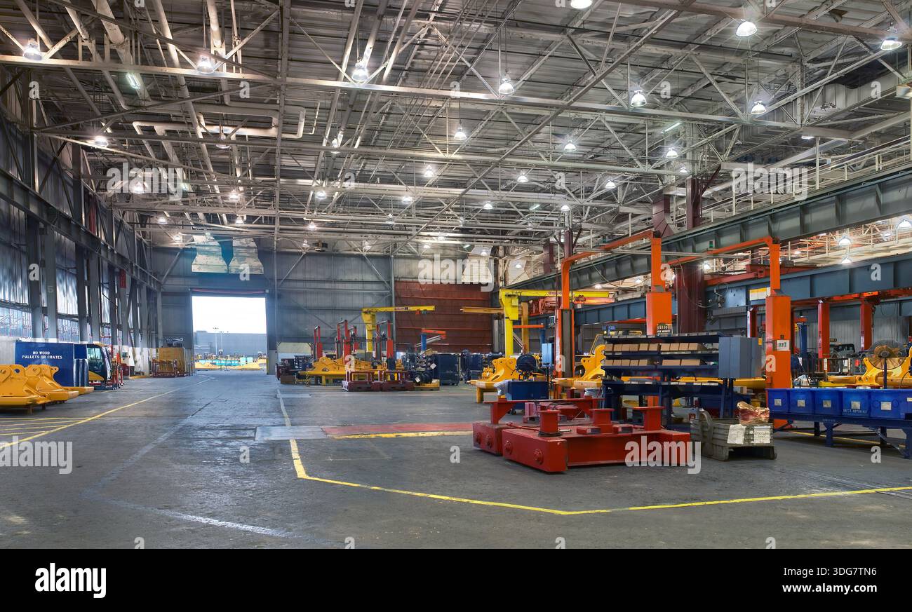 Large machines being assembled in factory, USA Stock Photo