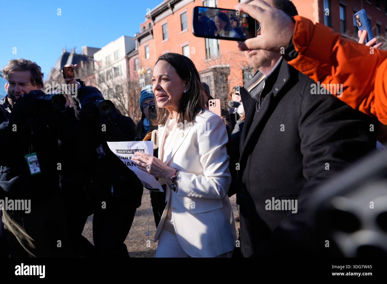 Venezuelan opposition leader María Corina Machado greets supporters on ...