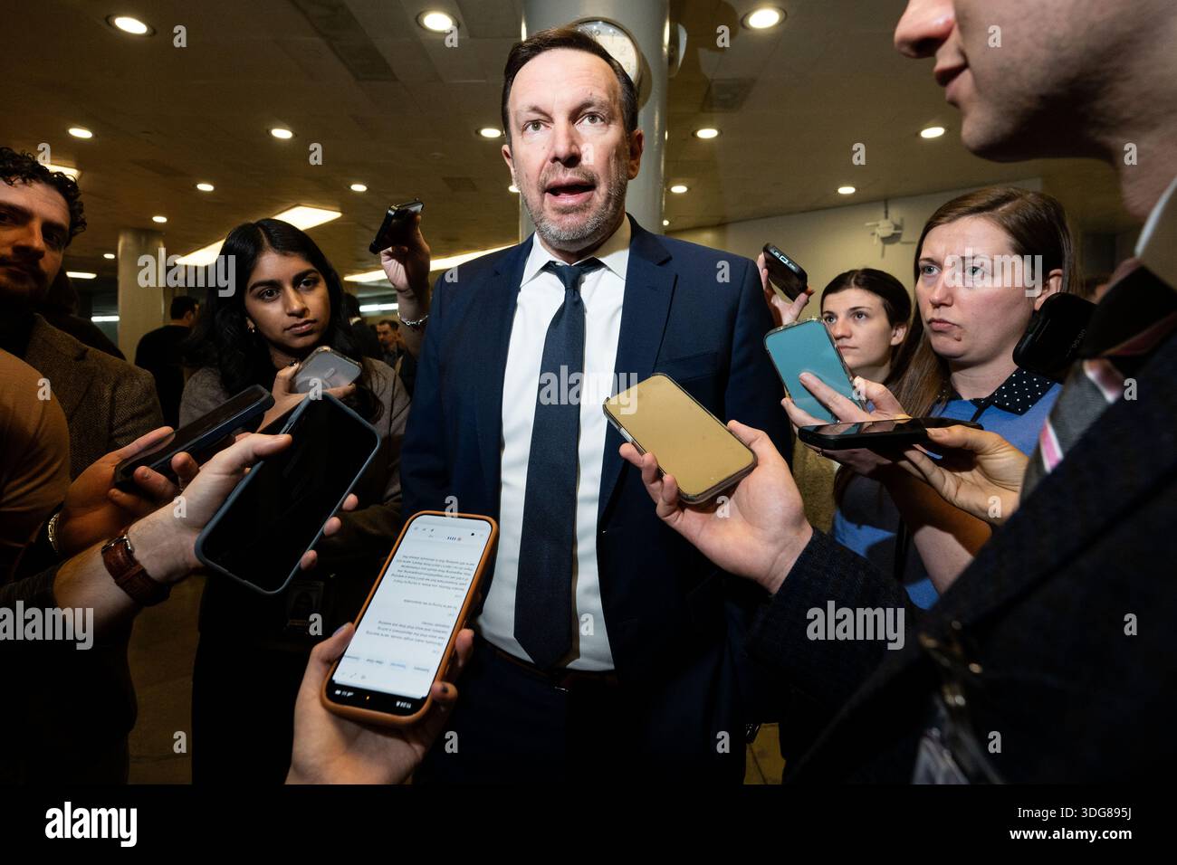 U.S. Senator Chris Murphy (D-CT) speaking with reporters near the ...