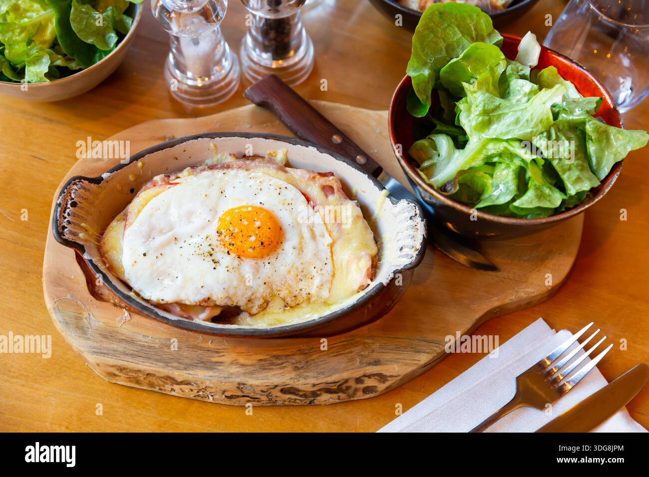 Swiss cheese crust with fried egg Stock Photo