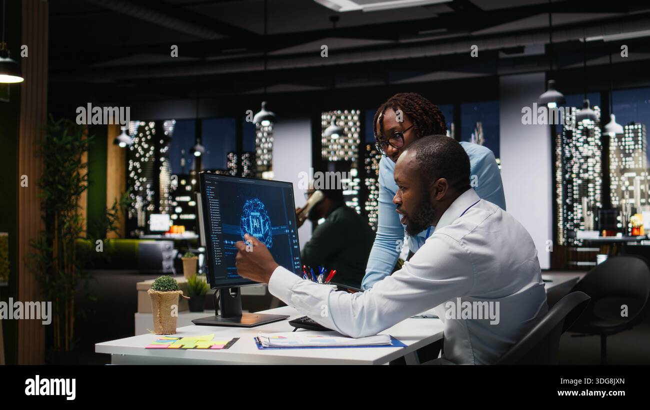 Black IT consultants workers use AI big data and predictive analytics, smart work solutions and cloud computing for adaptive strategies. Artificial intelligence engineering algorithms. Stock Photo