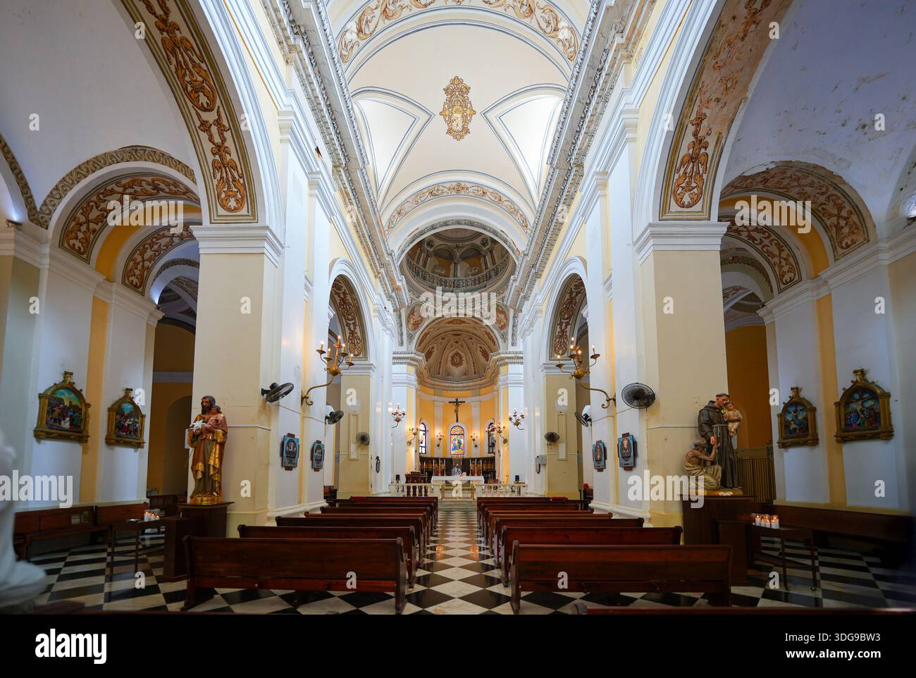 The grand nave and ornate altar of the Catedral Basilica Menor de San ...