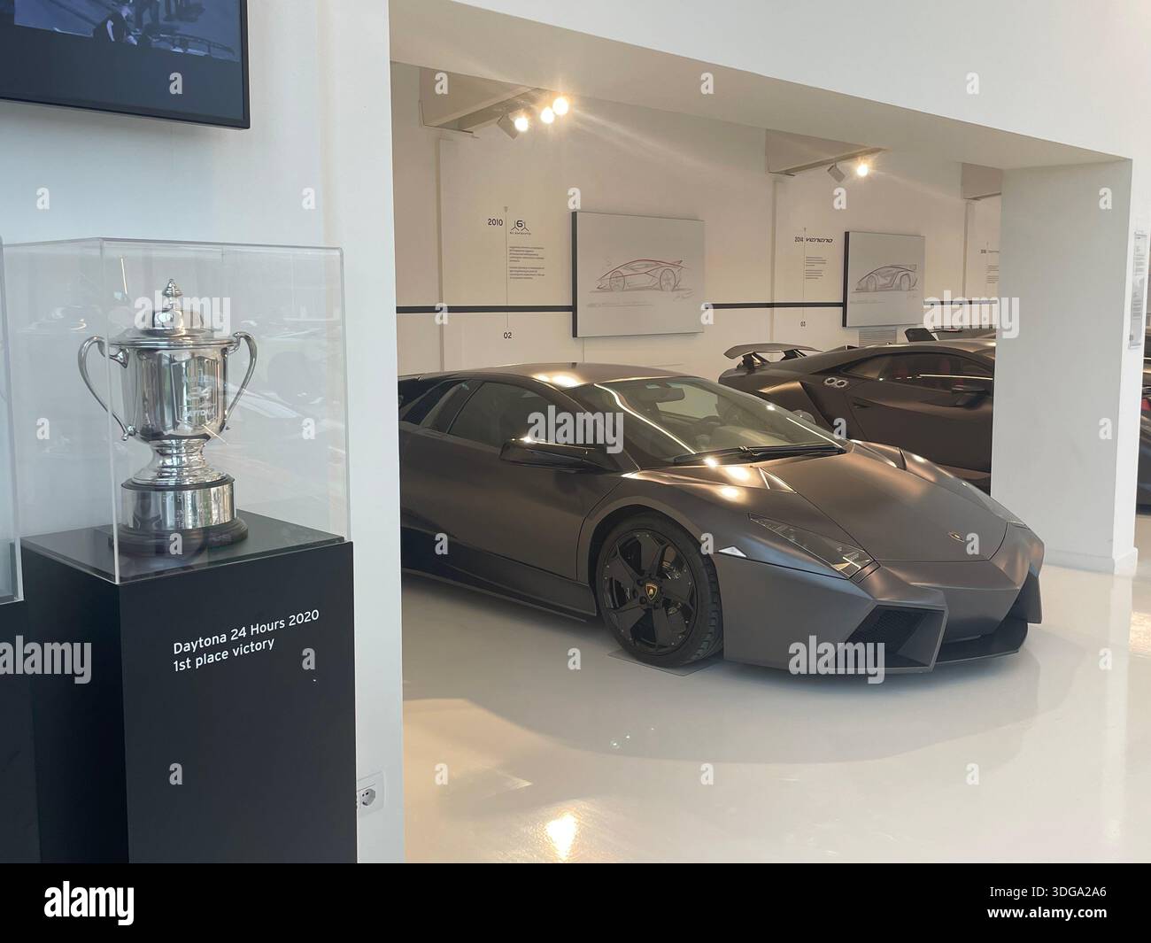 amborghini supercar on display inside an automotive museum in Italy, showcasing luxury design, high performance engineering and modern Italian automot - Smartphone Captured Stock Image