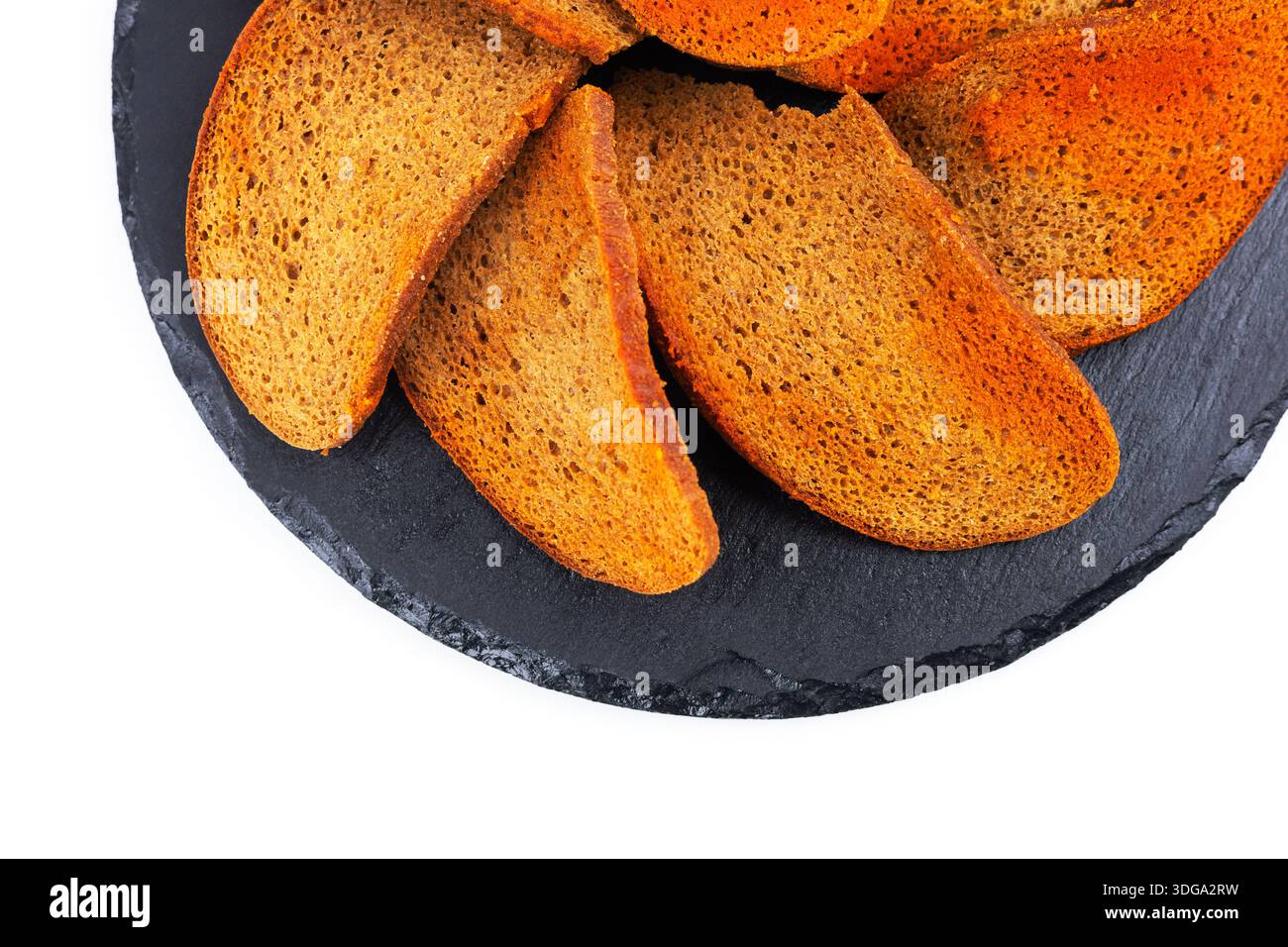 Rye bread crackers in spices on dark background, Beer snack, Stock Photo