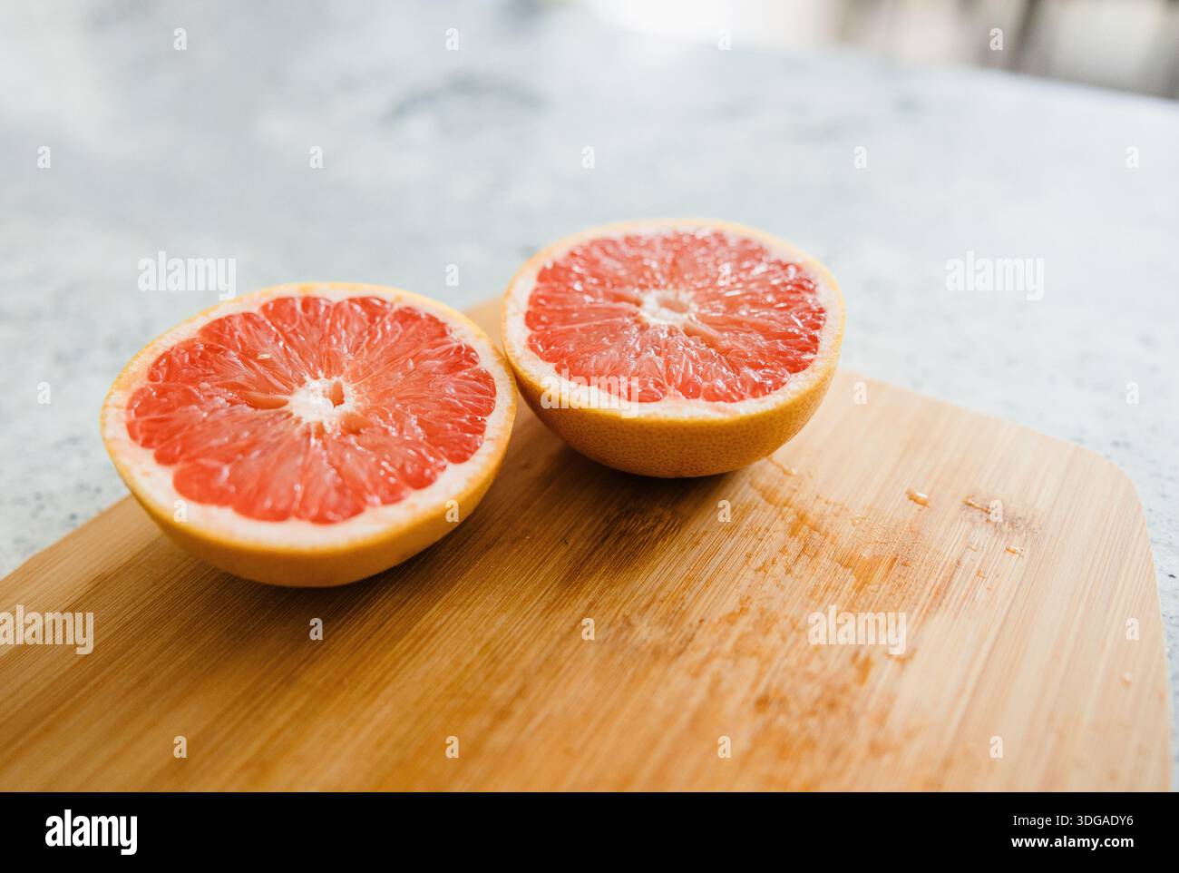 Ruby Red Grapefruit Sliced in Half Stock Photo