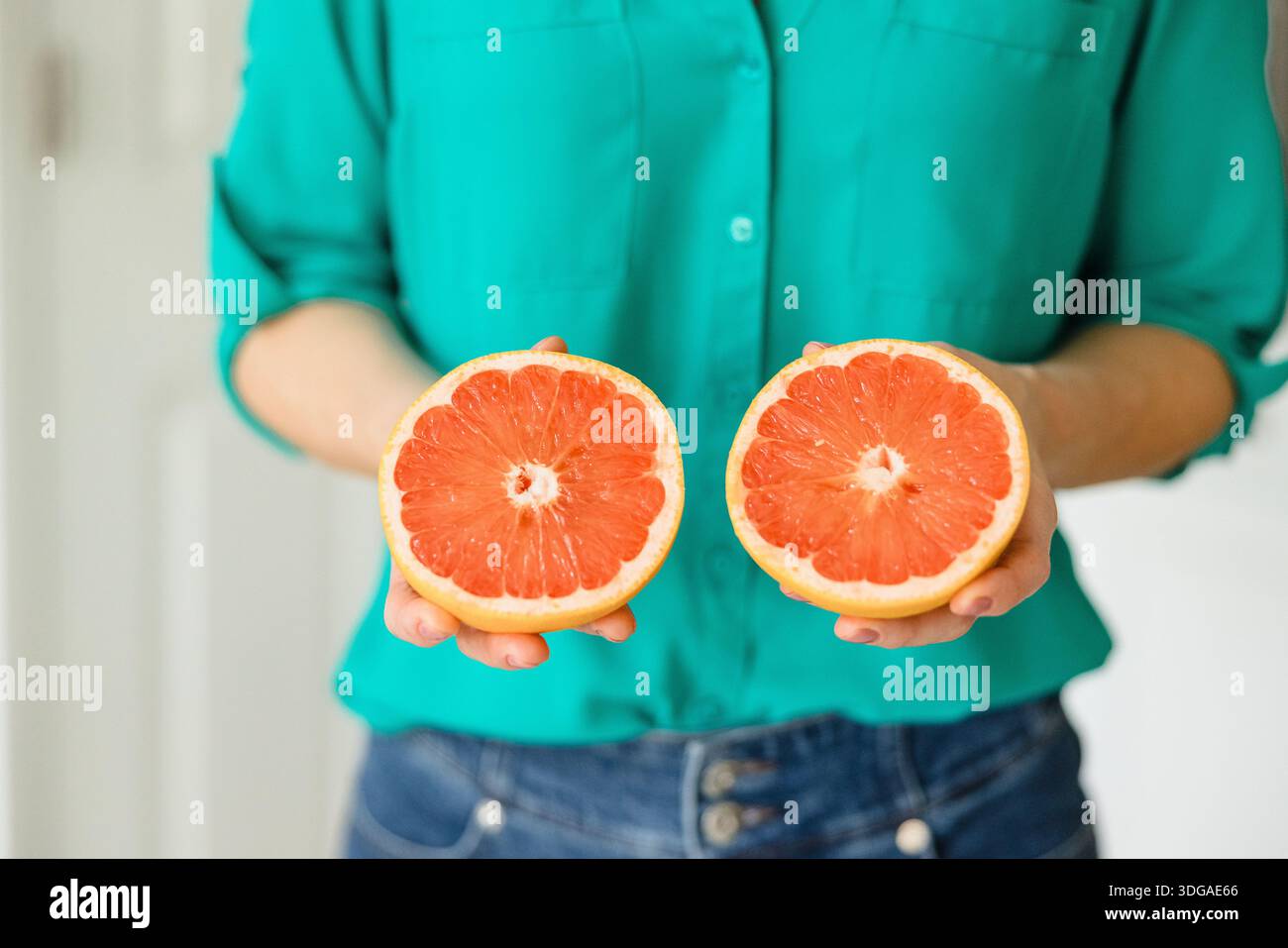 Beautiful Ruby Red Grapefruit Cut in Half Stock Photo