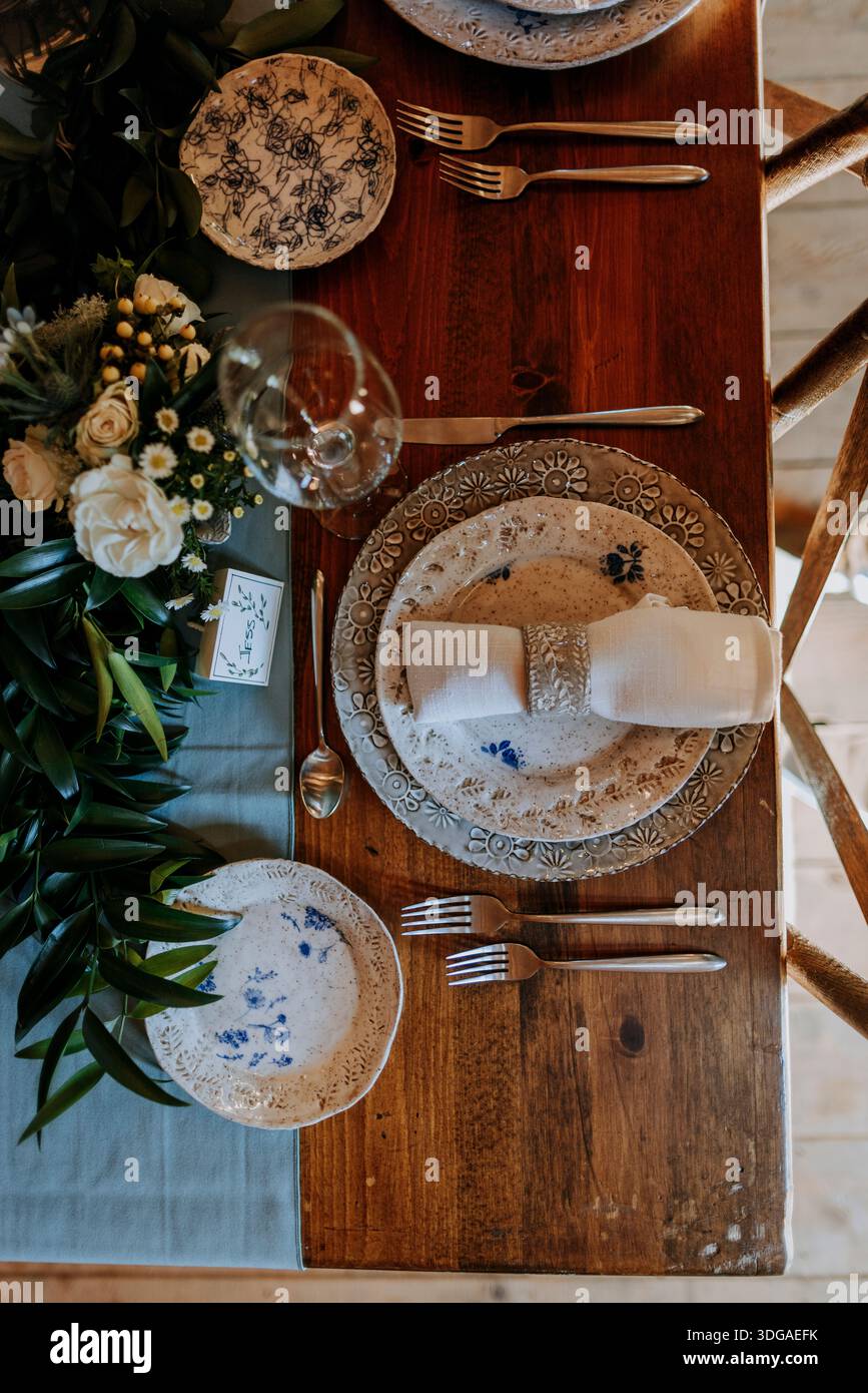 top down view of place setting at formal dinner table Stock Photo