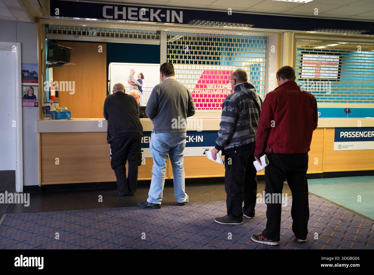Passengers at the check in desk at Newhaven to Dieppe DFDS car ferry ...