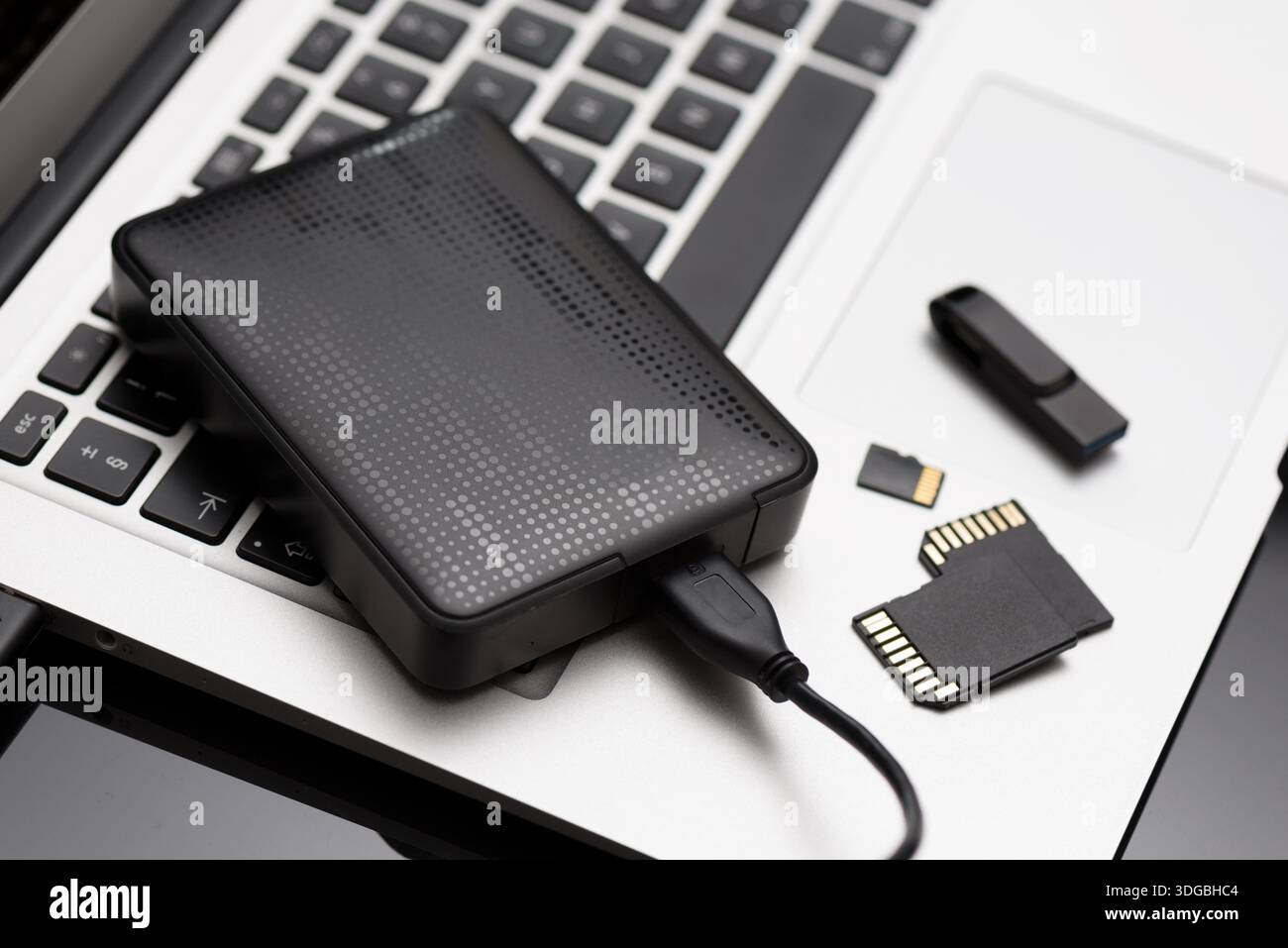 Multiple storage devices, data security, digital data storage Stock Photo