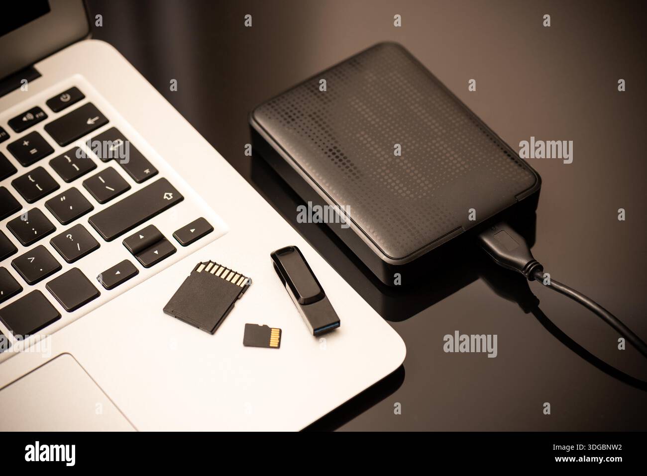 Multiple storage devices, data security, digital data storage Stock Photo