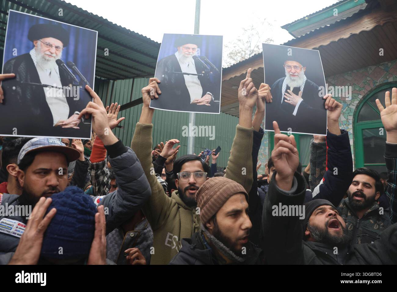 SRINAGAR, INDIA - JANUARY 16: Kashmiri Shiite Muslims shout slogans and ...