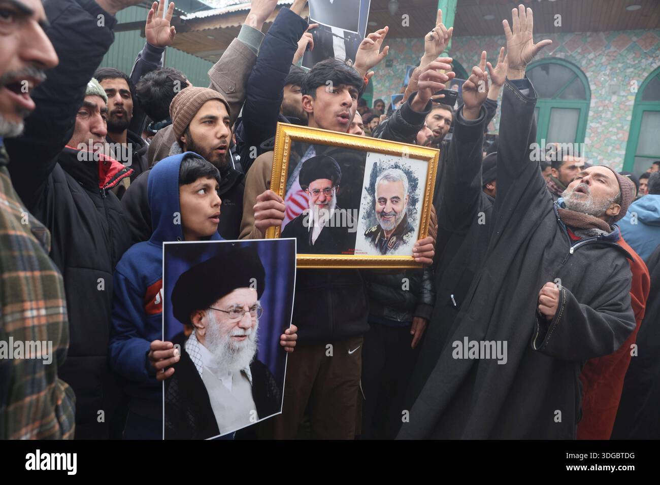 SRINAGAR, INDIA - JANUARY 16: Kashmiri Shiite Muslims shout slogans and ...