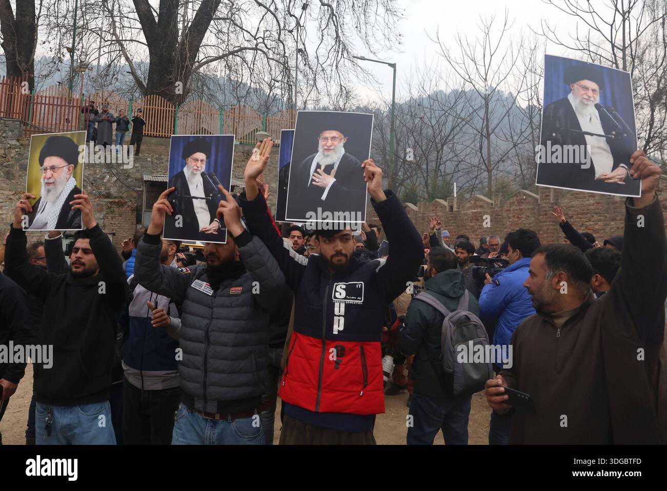 SRINAGAR, INDIA - JANUARY 16: Kashmiri Shiite Muslims shout slogans and ...