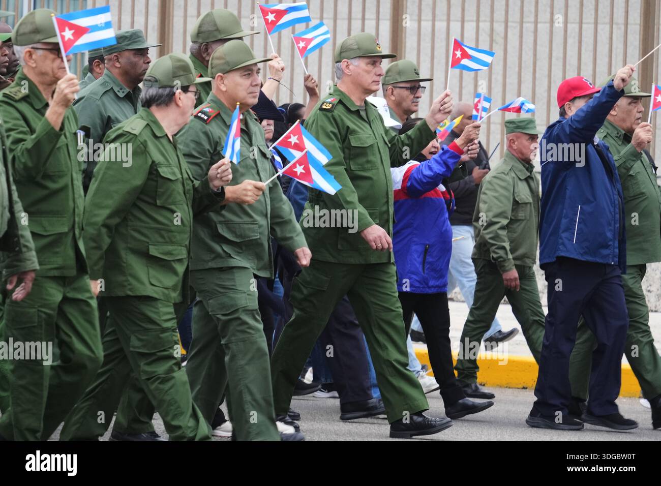 Cuban President Miguel Diaz-Canel marches during a rally to protest the ...