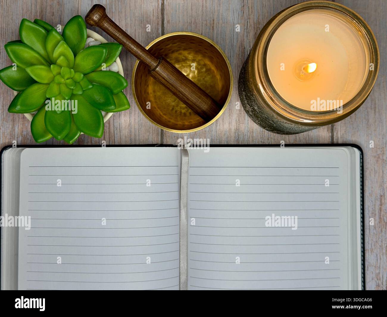 Mindfulness Journaling and Meditation Self Care Flat Lay With Candle and Singing Bowl - Smartphone Captured Stock Image