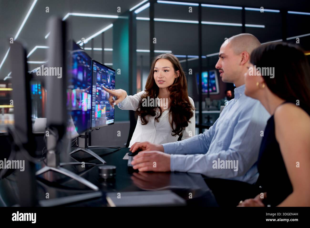 Analyzing KPIs On Computer Dashboard: A Business Marketing Team's Task Stock Photo