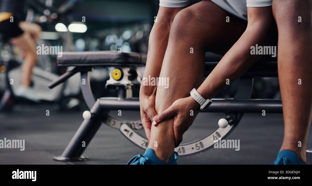 Sports, hands and man at gym with ankle pain, injury or accident for ...