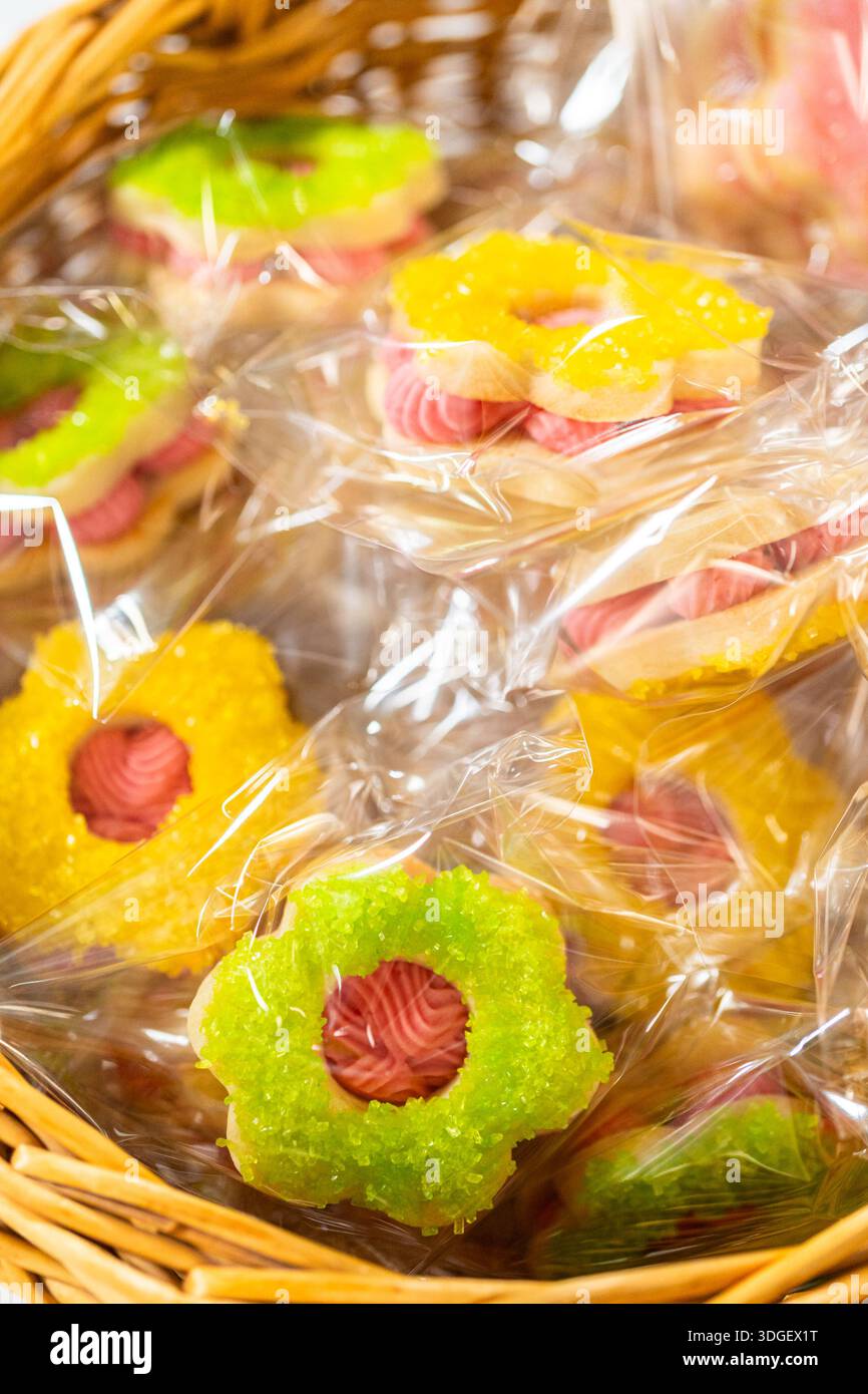 Wrapped Easter Cookie Sandwiches in Basket Stock Photo