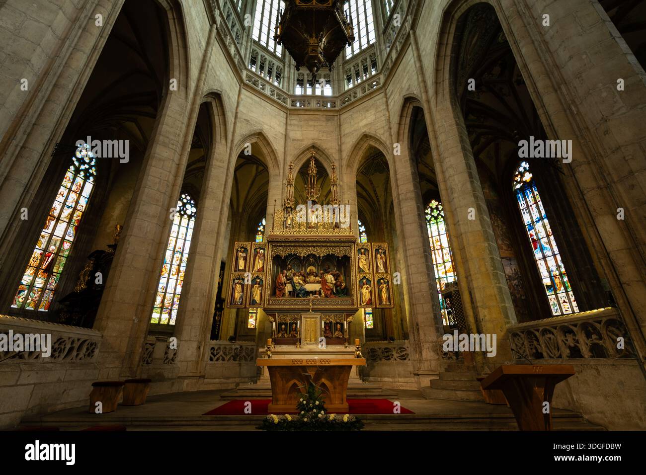 Main altar with neo-Gothic Last Supper relief and ornate gilded reredos ...