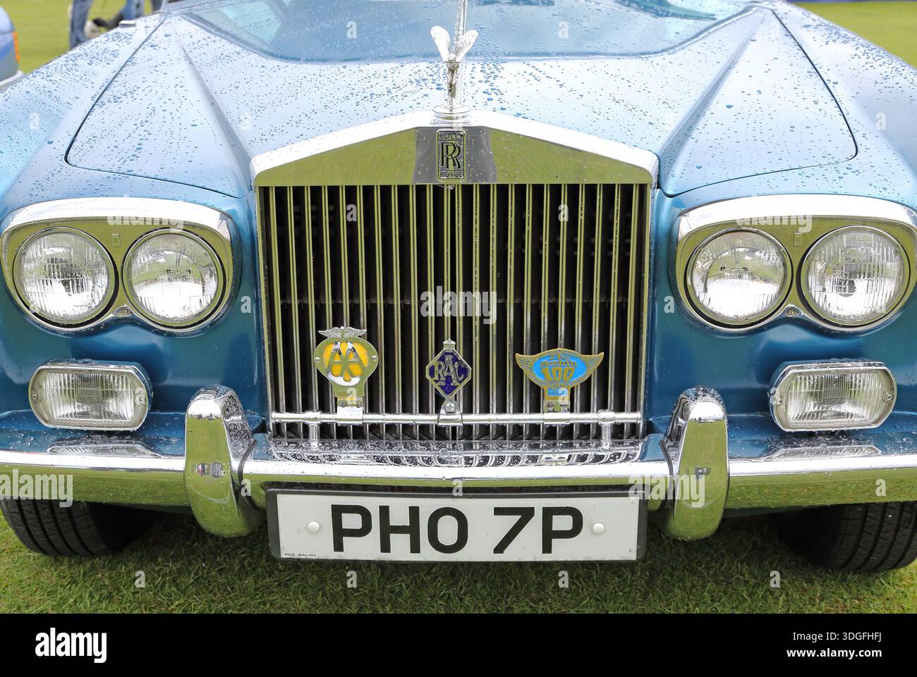 front and radiator grille and headlights of an old rolls royce classic car Stock Photo