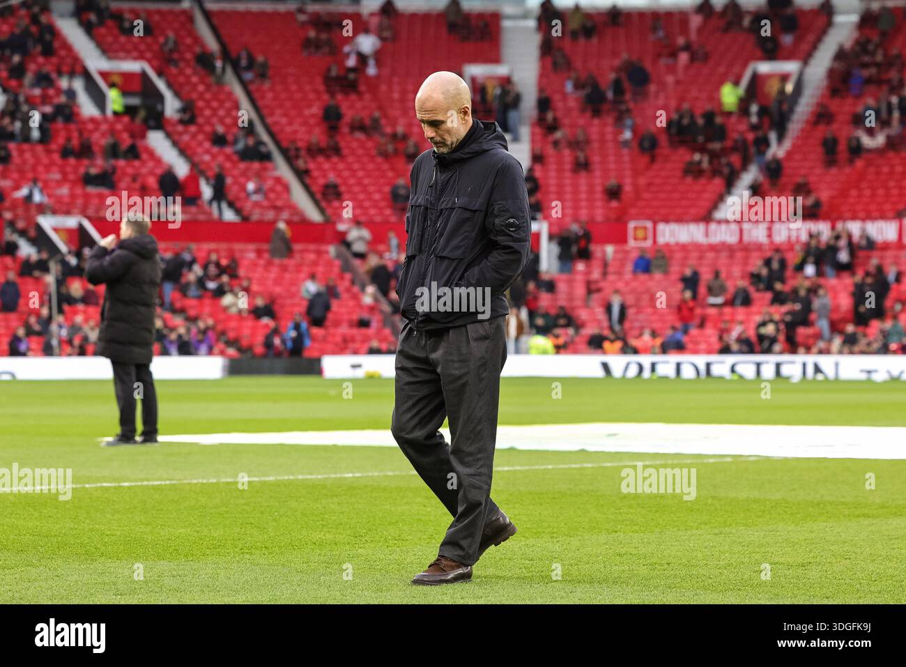 Pep Guardiola manager of Manchester City inspects the pitch during the ...