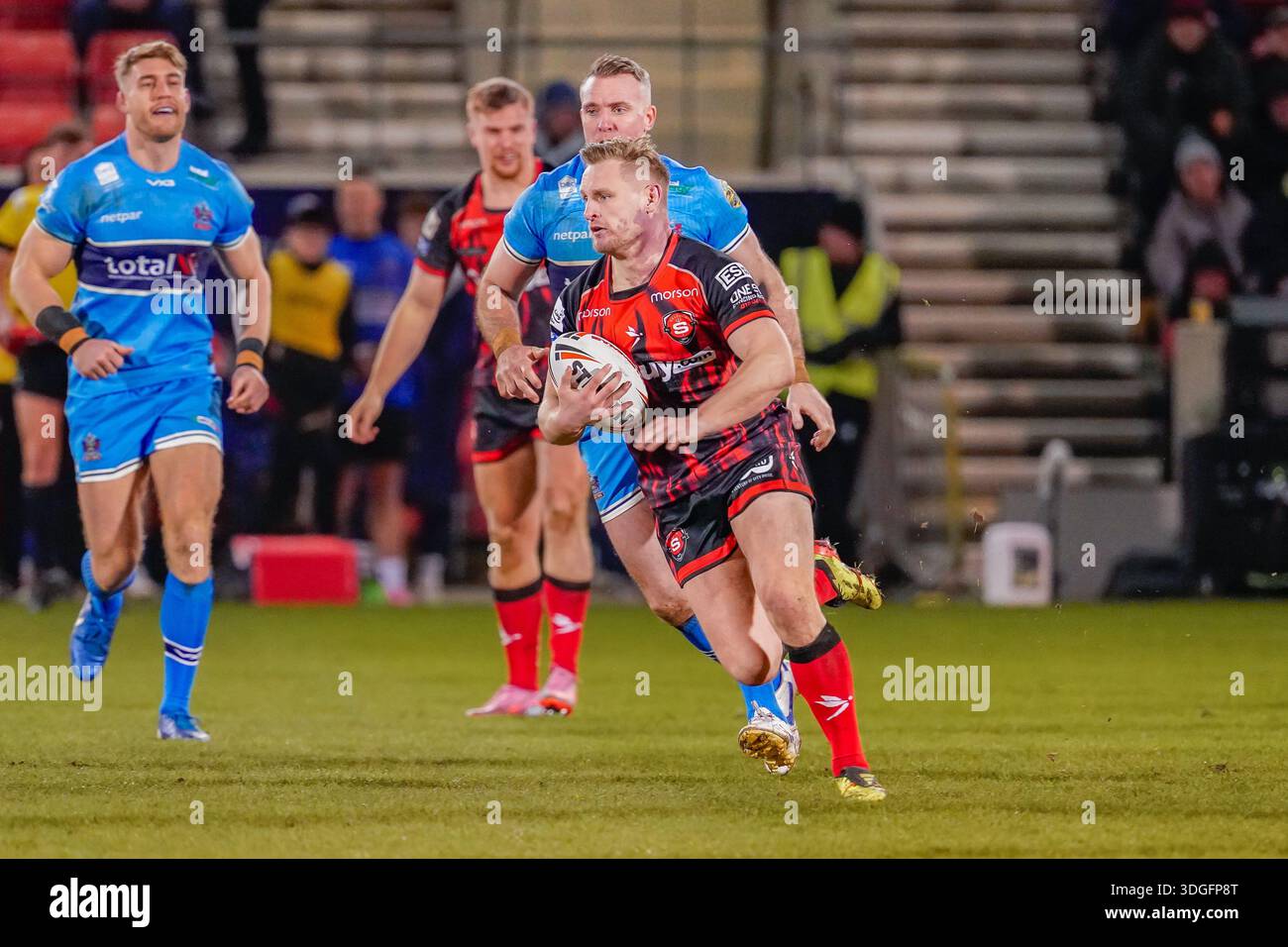 Brad Adams Rugby MANCHESTER, ENGLAND - January 16: Brad Dwyer of Salford RLFC runs for ...