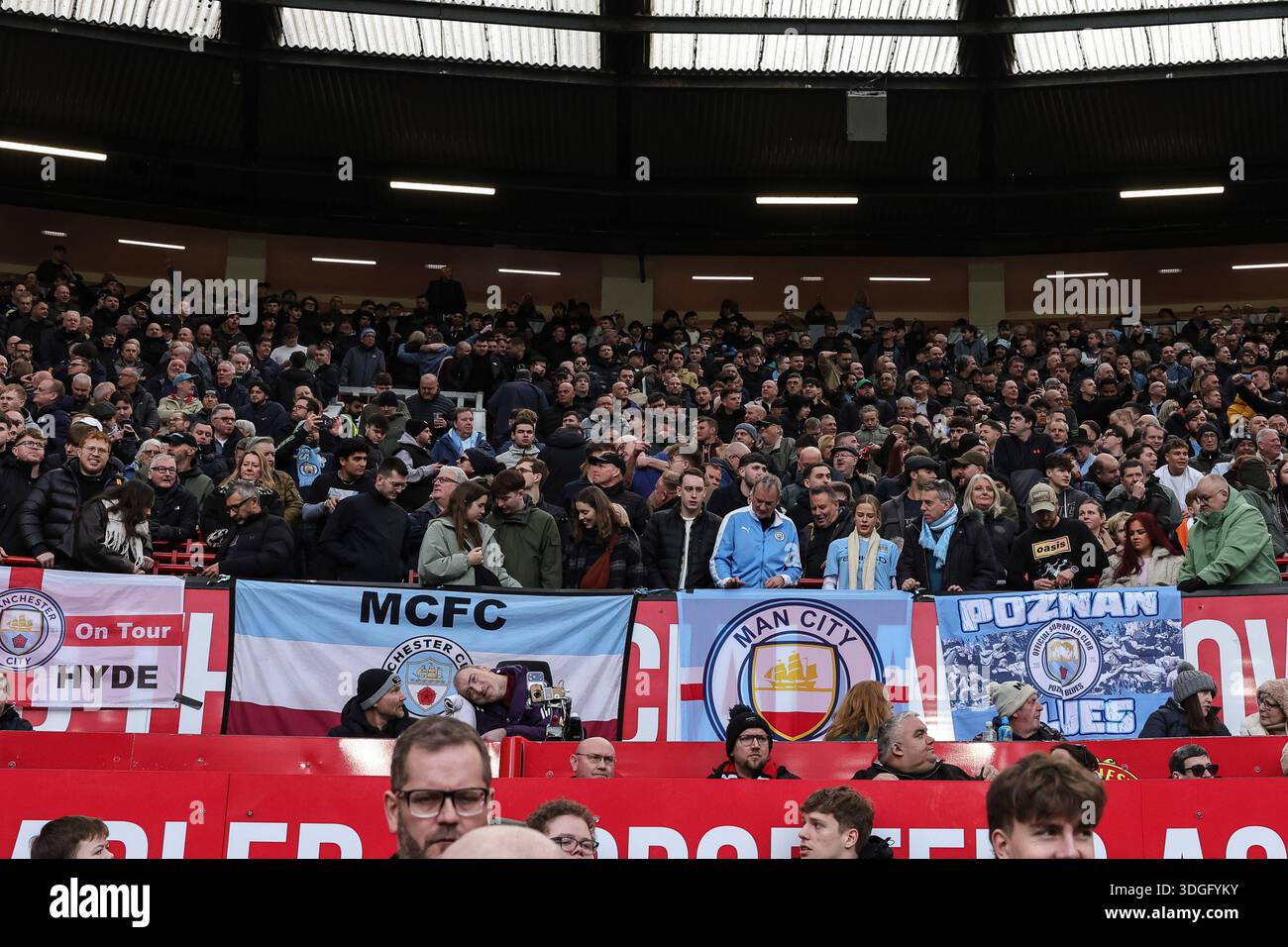 Manchester, UK. 17th Jan, 2026. City fans placer their flags over the ...