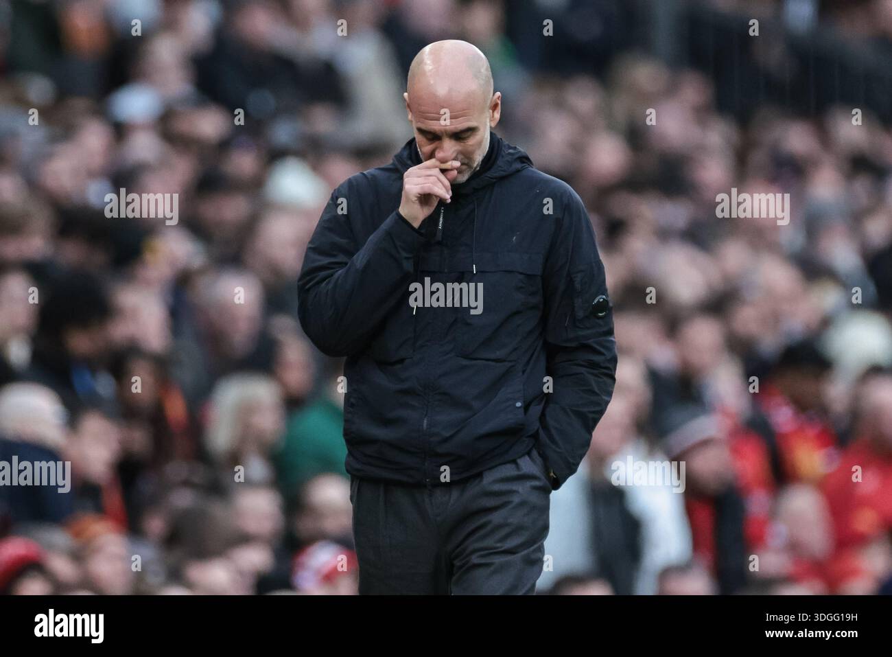 Pep Guardiola manager of Manchester City deep in thought during the ...
