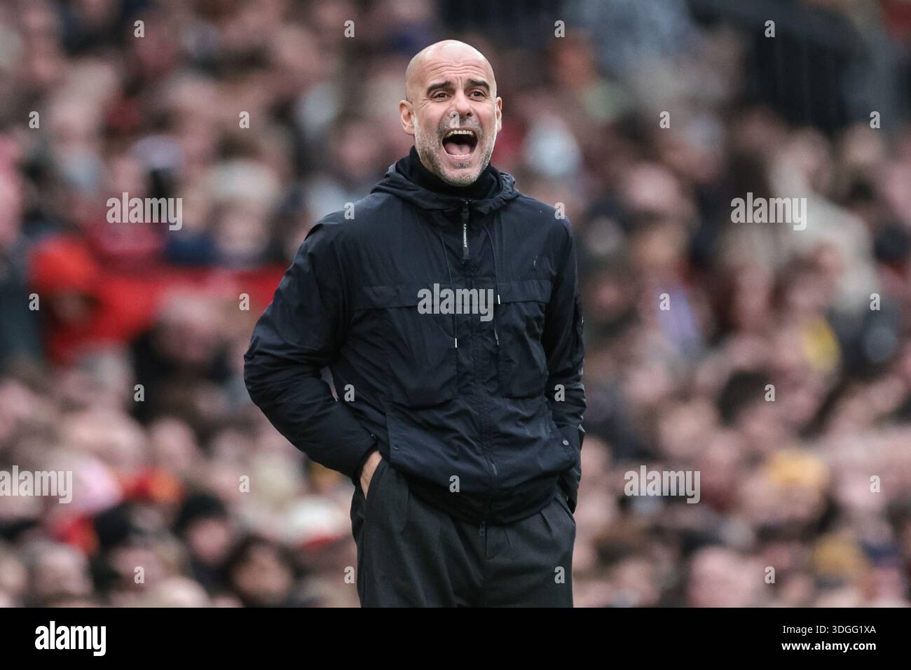 Pep Guardiola manager of Manchester City shouts instructions during the ...