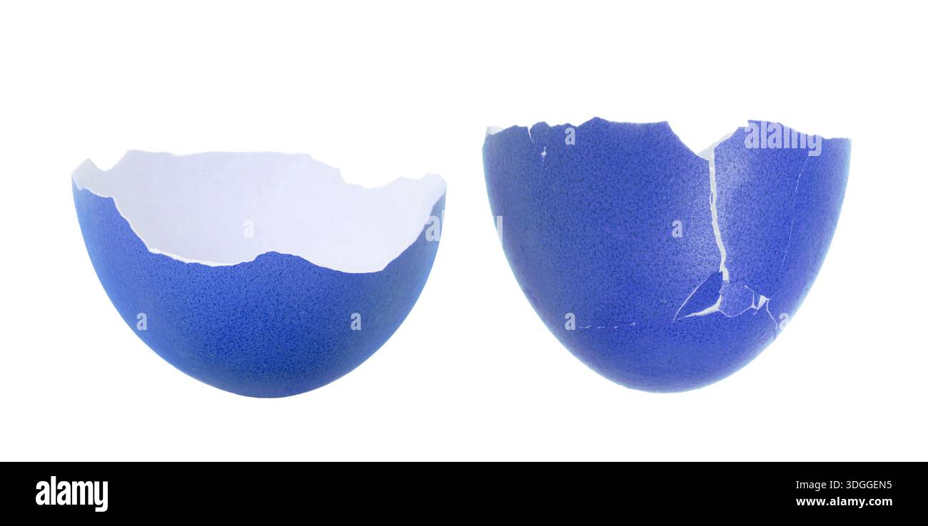 Cracked dyed Easter egg on white background Stock Photo