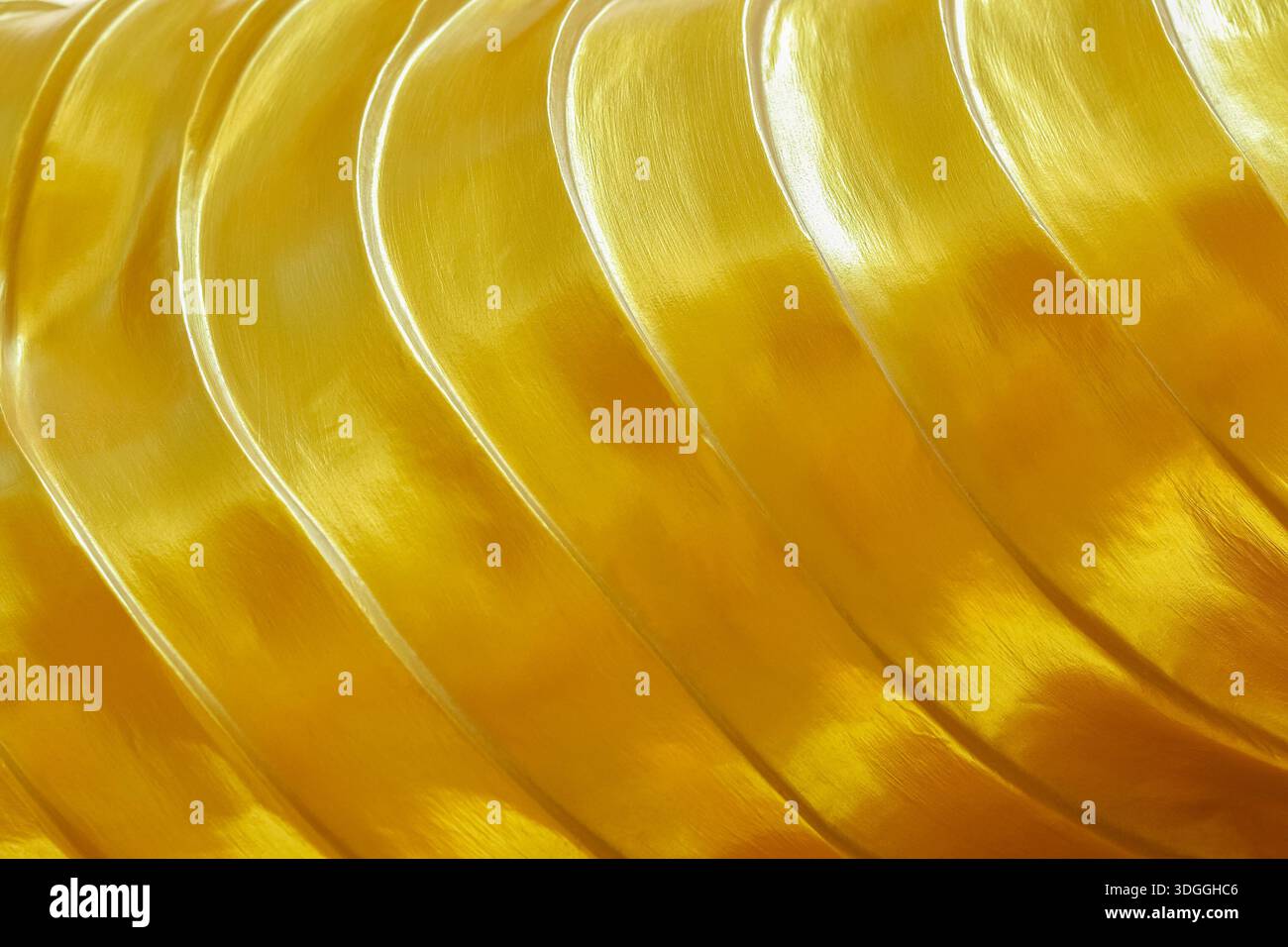 wavy gold texture for background and design. Stock Photo