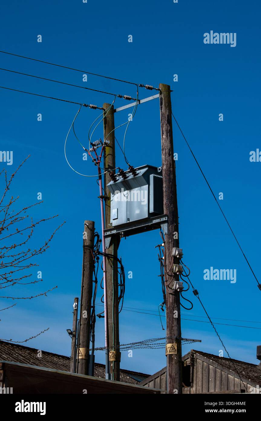 Electicity pylon relaying power from the National Grid. Stock Photo