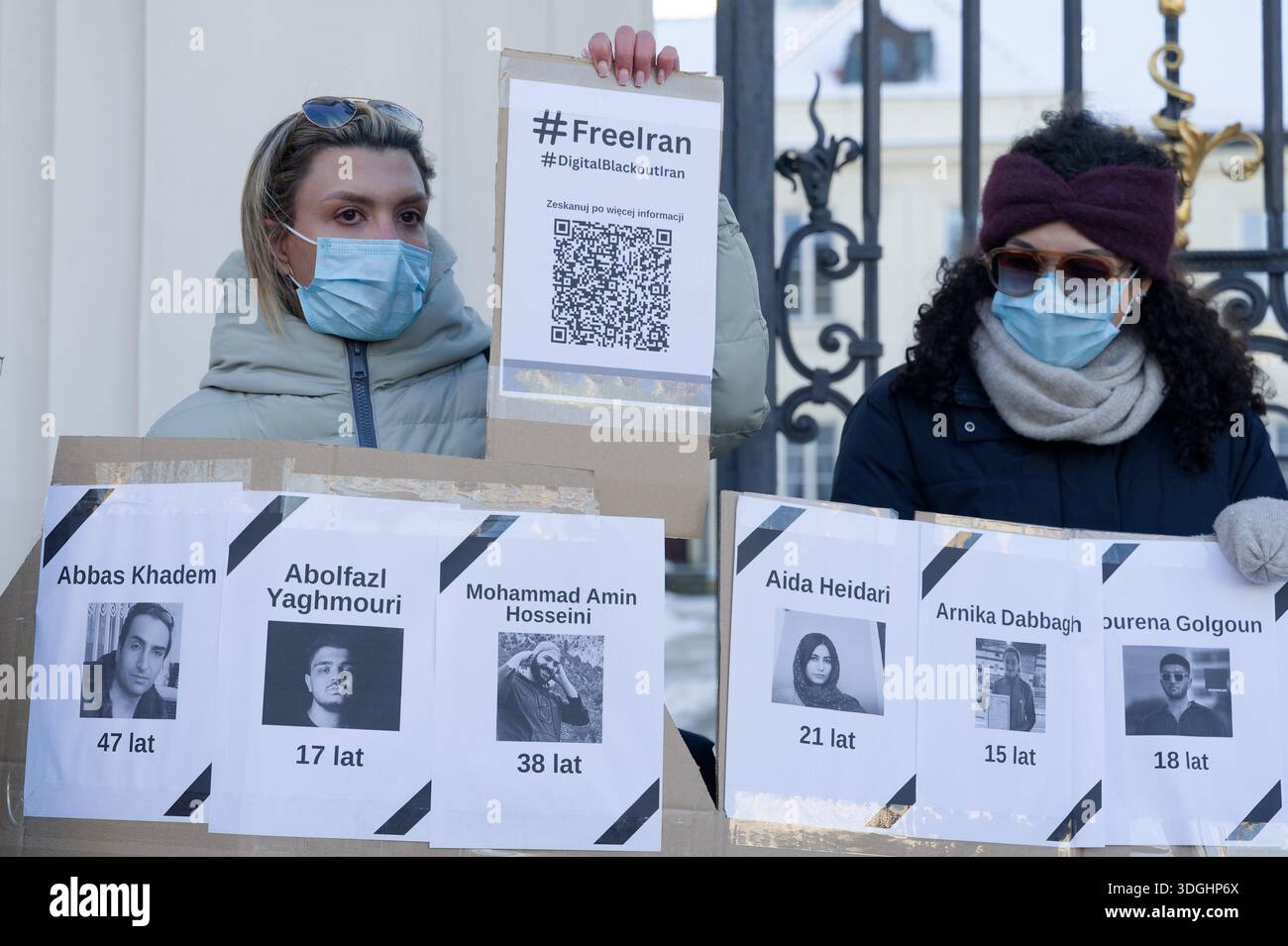 Warsaw, Poland, 17th Jan., 2026. Protesters display QR code and “Free ...