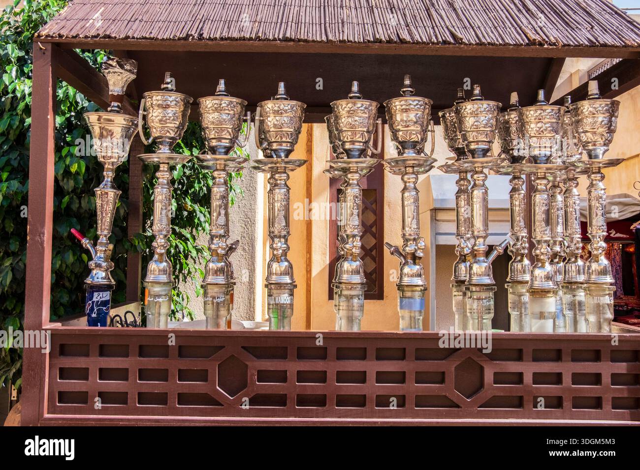 U.A.E. United Arab Emirates, Dubai. The Dubai Jebel Ali Village Mall.  Outdoor shisha, hooka bar for smoking flavored tobacco Stock Photo