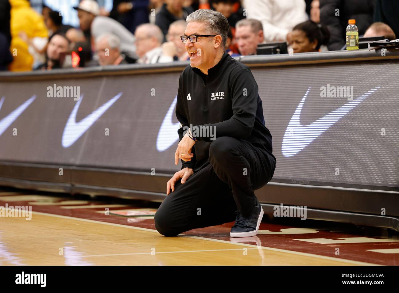 Blair Academy head coach Joe Mantegna works the sidelines against TMI ...