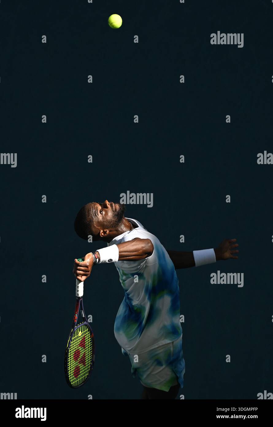 Melbourne, Australia. 18th Jan, 2026. Frances Tiafoe of USA prepares to