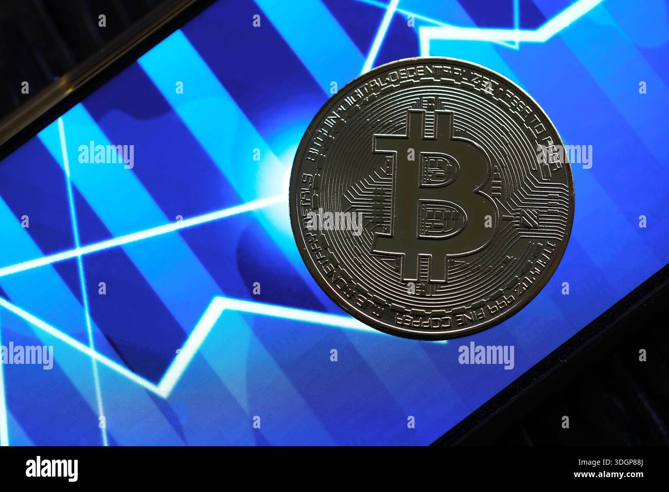 Bitcoin gold coin and defocused chart background. Virtual cryptocurrency  Stock Photo - Alamy