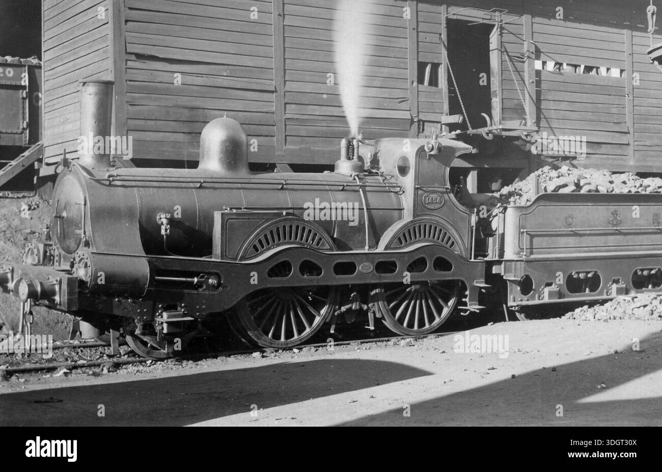 Benjamin Brittain designed Caledonian Railway 2-4-0 steam locomotive No.1454 at St. Rollox coaling stage Stock Photo