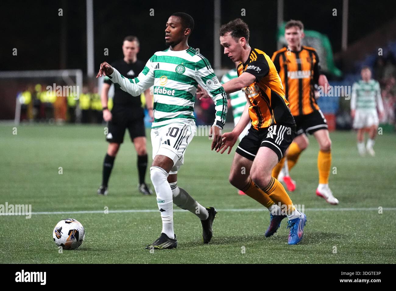 Celtic's Michel-Ange Balikwisha and Auchinleck Talbot's Cameron Crooks ...