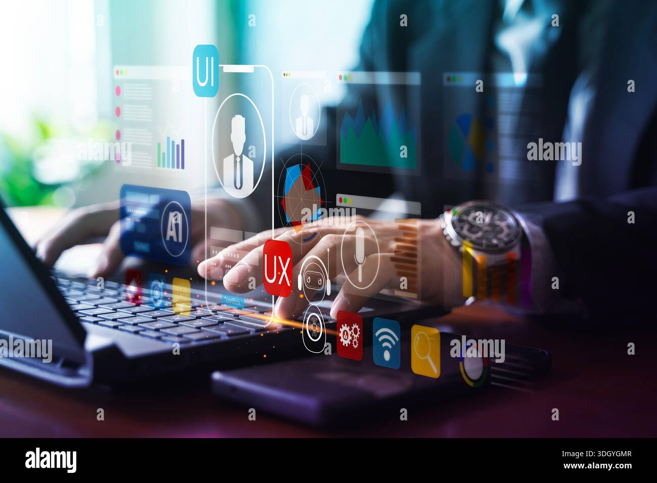 Businessman typing on laptop with virtual UI/UX, AI and dashboard icons, representing user interface design, product development, usability testing, a Stock Photo