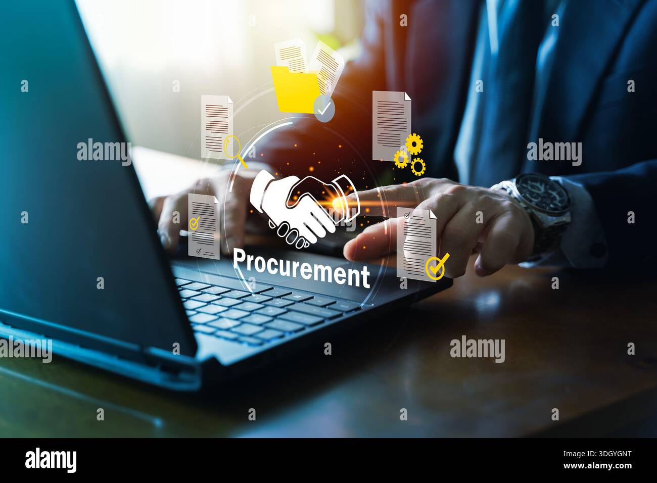 Business professional typing on laptop with procurement handshake icon ...