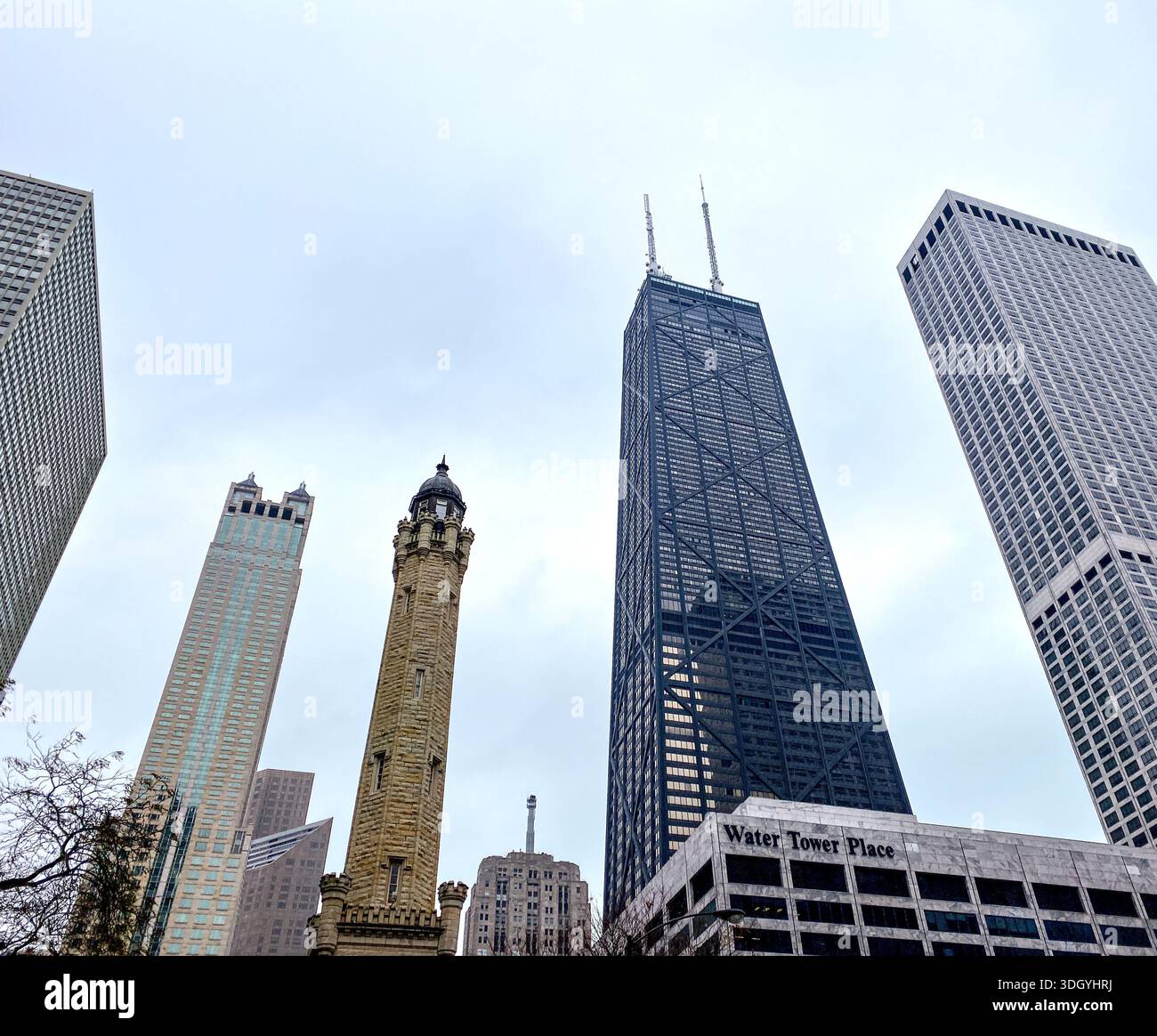 upward view of Chicago Water Tower and John Hancock Center in Chicago, Illinois, USA - Smartphone Captured Stock Image