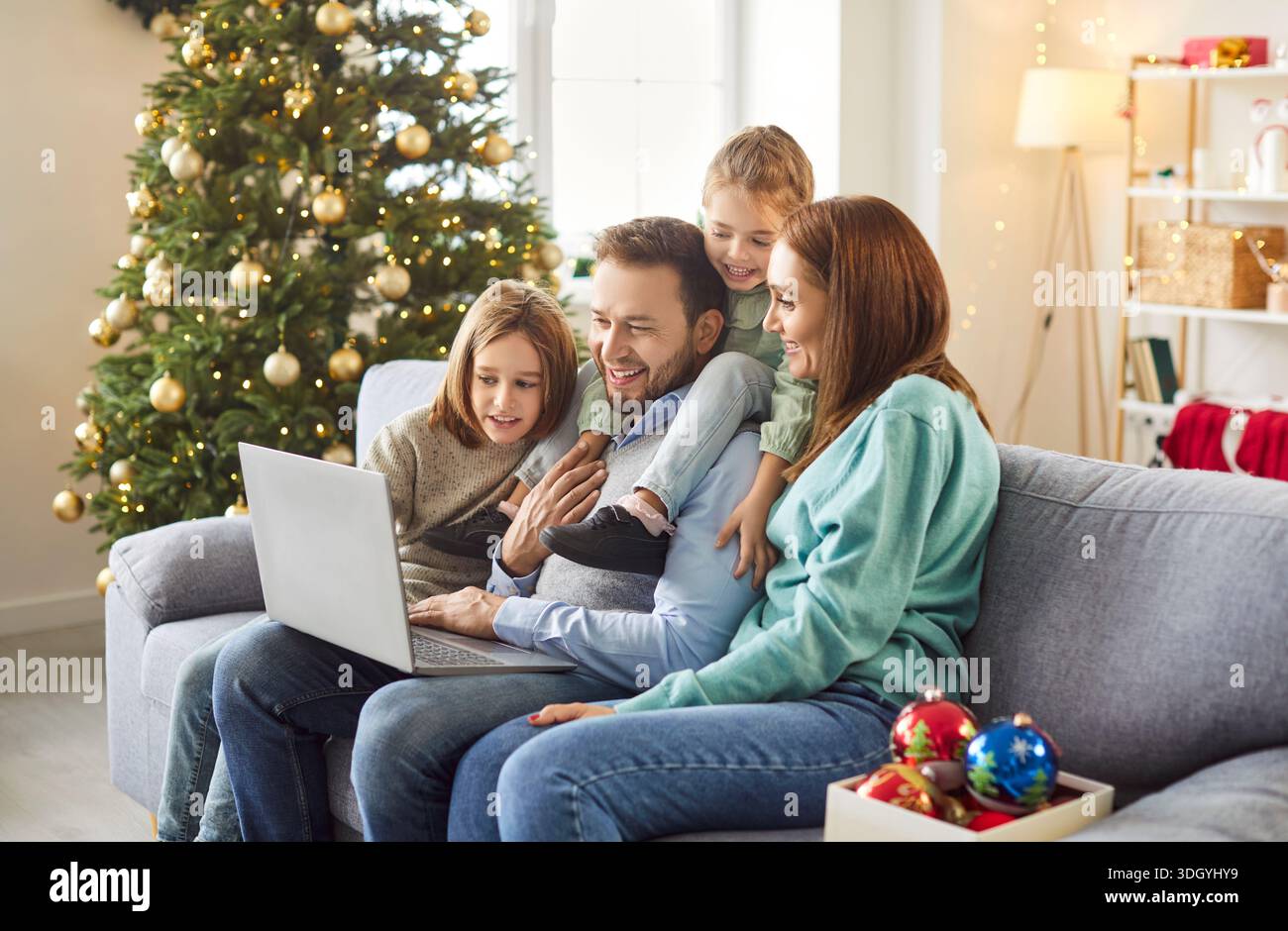 Happy relatives enjoying video call hi-res stock photography and images ...