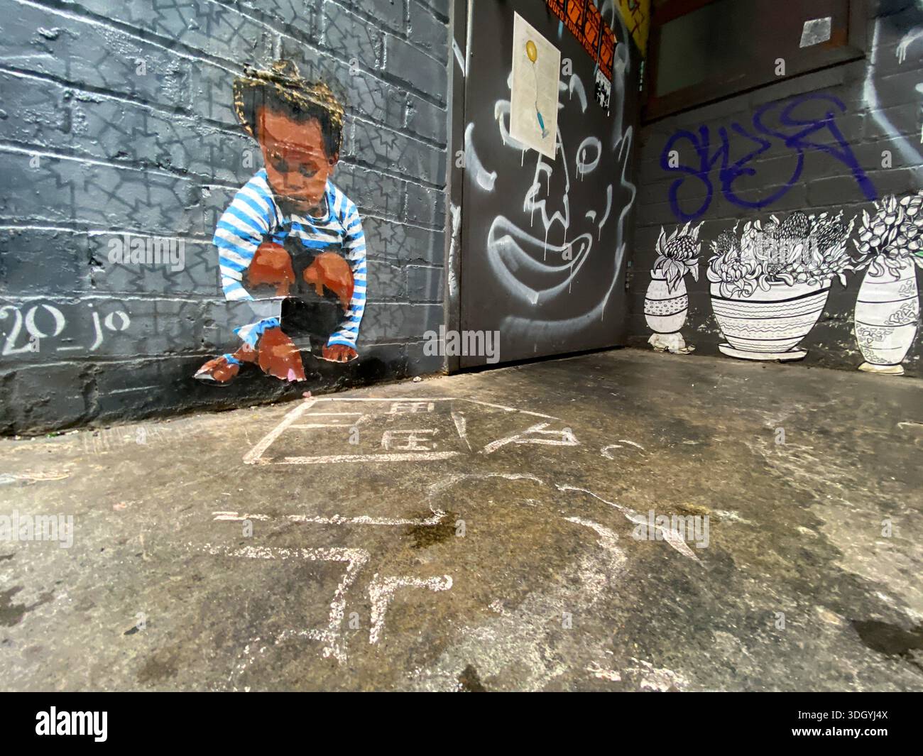 Urban art/graffiti in Melbourne reflecting disparity in social issues - Smartphone Captured Stock Image