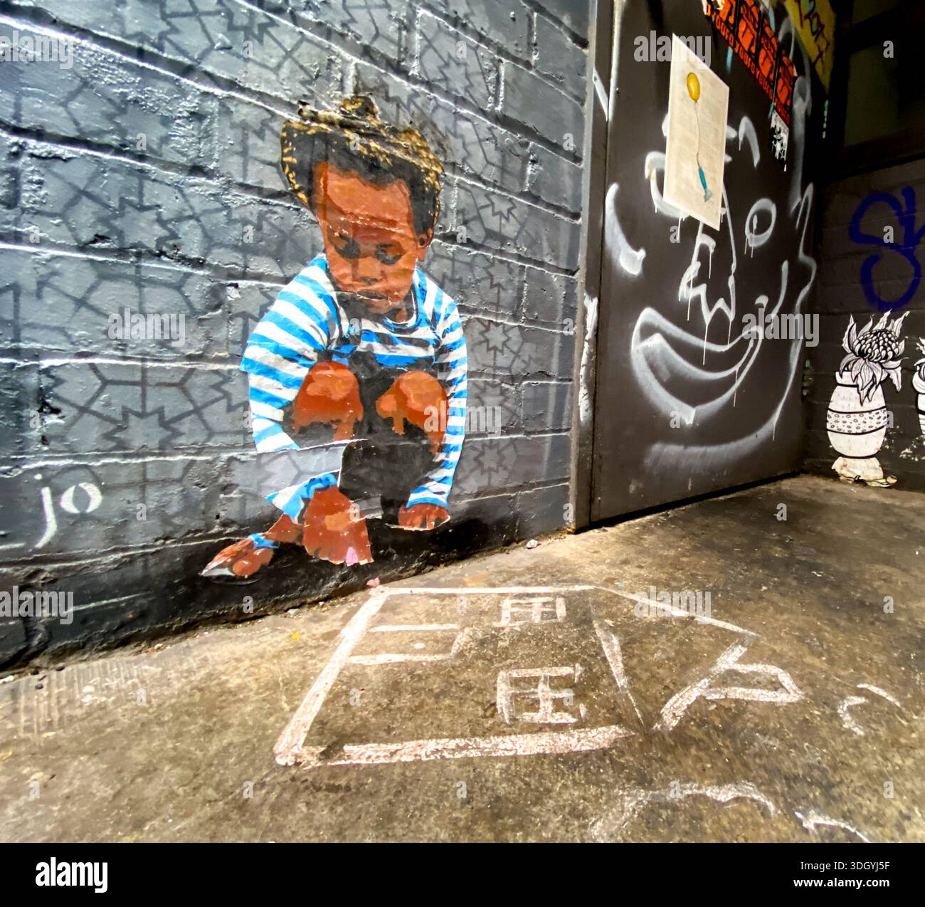 Urban art/graffiti in Melbourne reflecting disparity in social issues - Smartphone Captured Stock Image