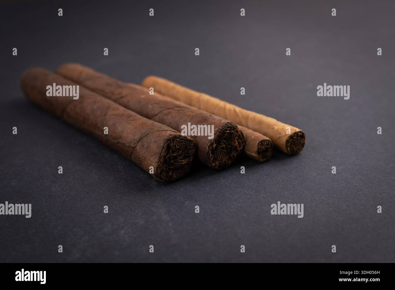 Tobacco leaf wrapped hi-res stock photography and images