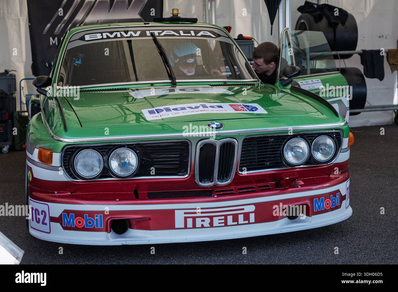 Front view of a stunning green and red 1975 BMW 3.0 CSL classic race ...