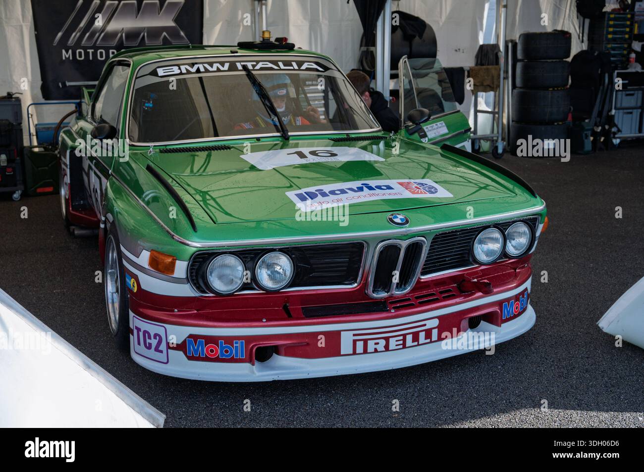 Front view of a stunning green and red 1975 BMW 3.0 CSL classic race ...