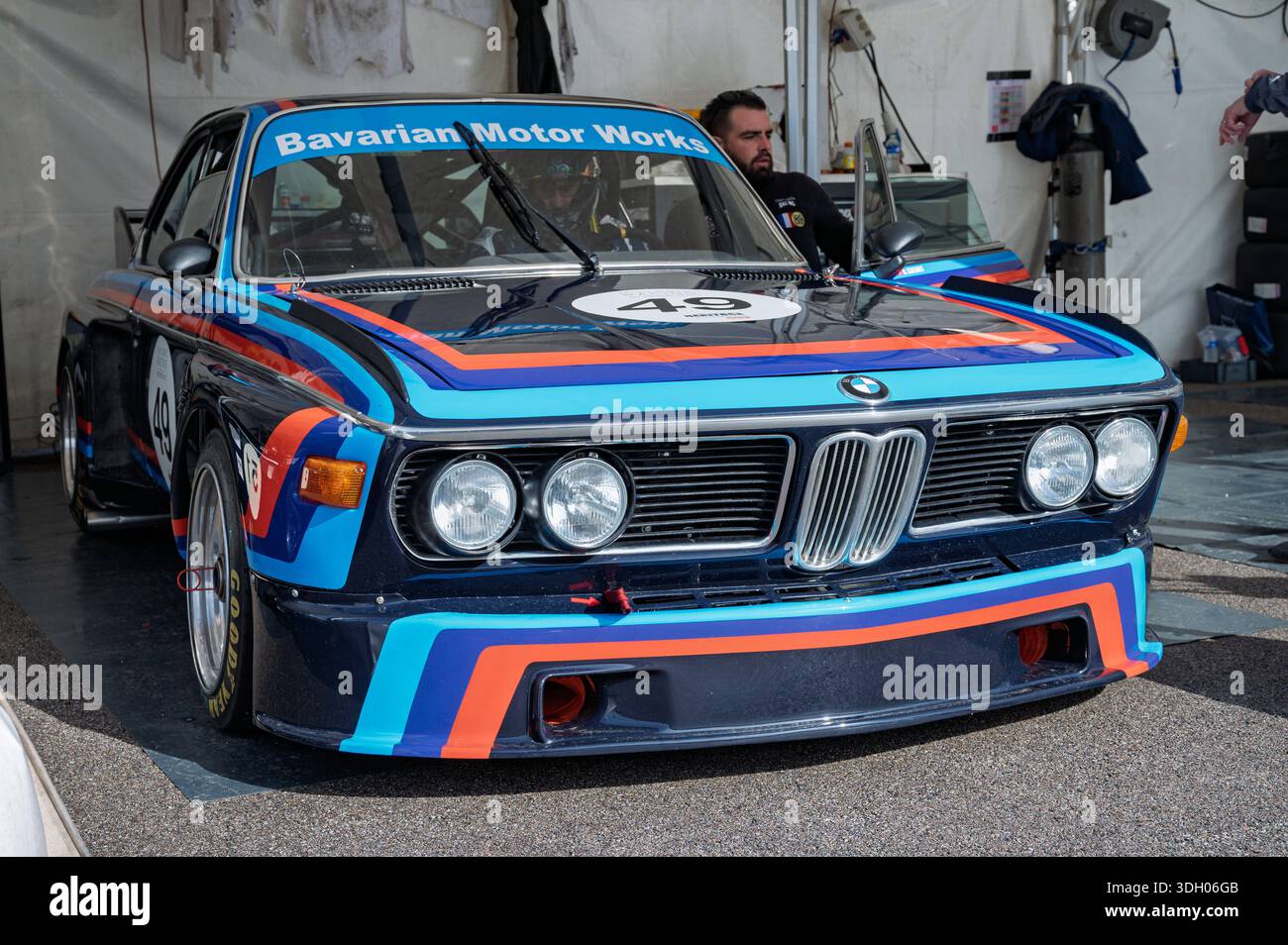 Front view of a stunning dark blue 1975 BMW 3.0 CSL classic race car ...