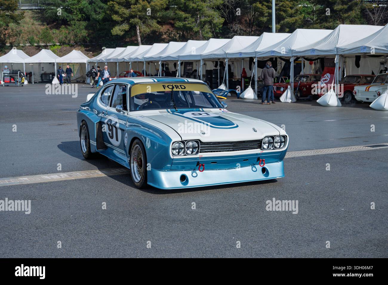 Front view of a classic 1975 blue and white Ford Capri RS 3100